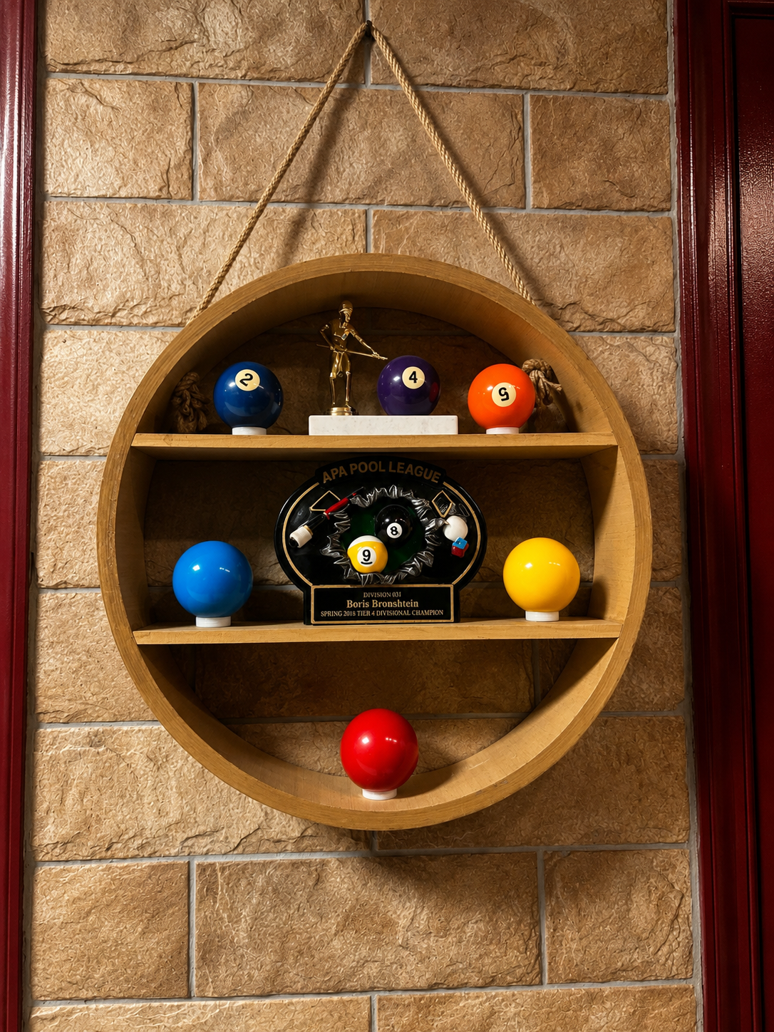 Pool award display and billiards detail inside Gentlemen's Cue Club